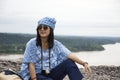 Asian travelers thai women travel and posing at viewpoint cliffs Royalty Free Stock Photo