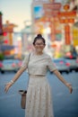 Asian traveling woman happiness emotion in yaowarat china town i Royalty Free Stock Photo