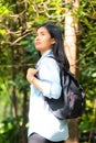 Asian traveller backpacker woman walk in the park