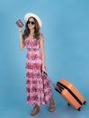 Asian traveller woman in red dress and travel bag