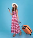 Asian traveller woman in red dress and travel bag
