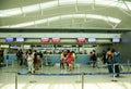 Asian travellers at departure terminal in airport Royalty Free Stock Photo