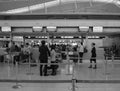 Asian travellers at departure terminal in airport Royalty Free Stock Photo