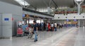 Asian travellers at departure terminal in airport Royalty Free Stock Photo