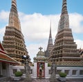 Asian travellert woman walking in Pagoda area in Wat Pho near Thailand grand palace and wat phra kaew