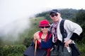 Asian trekkers man and woman outdoors park.