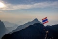 Asian trekking woman holding Thailand flag Royalty Free Stock Photo