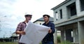 Asian two engineers are planning the construction Royalty Free Stock Photo