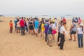 Asian vacationers or day trippers doing their activities on the beach Royalty Free Stock Photo