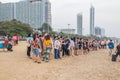 Asian vacationers or day trippers doing their activities on the beach Royalty Free Stock Photo