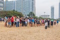 Asian vacationers or day trippers doing their activities on the beach Royalty Free Stock Photo