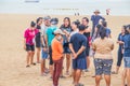 Asian vacationers or day trippers doing their activities on the beach Royalty Free Stock Photo