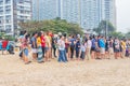 Asian vacationers or day trippers doing their activities on the beach Royalty Free Stock Photo