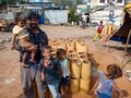 Asian village childrens portrait with father at workplace in India January 2020