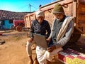 Asian village old men learning about laptop technology at rural area in india January 2020 Royalty Free Stock Photo
