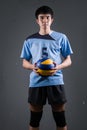 Asian volleyball athlete in action Royalty Free Stock Photo