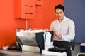 asia waiter served and serving coffee in cafe or restaurant