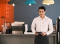 asia waiter served and serving coffee in cafe or restaurant