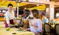 Asian waitress brought tray with restaurant guests Royalty Free Stock Photo