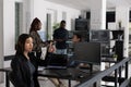 Asian web developer working with hologram and coding language Royalty Free Stock Photo