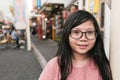 Asian white girl, smiling in the market street, Japan Royalty Free Stock Photo