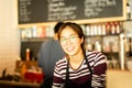 Asian woman amiling work in small business owner food and drink cafe. Royalty Free Stock Photo