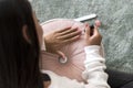 Asian woman applying nail polish Royalty Free Stock Photo