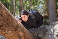 Asian woman backpack taking a photo with mirrorless camera Royalty Free Stock Photo