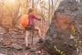 Asian woman with backpack trekking and hike in autumn fall Royalty Free Stock Photo