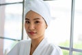 Asian woman on bed getting spa massage facil service Royalty Free Stock Photo