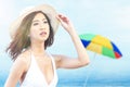 Asian woman with bikini and hat relaxing Royalty Free Stock Photo