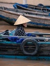 Asian woman in a boat in the Mekong Delta