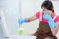 Woman brush the toilet