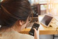 Asian woman, businesswoman using smartphone, laptop, tablet to contact friends or customer on online application platform. Woman Royalty Free Stock Photo