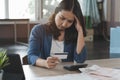 Asian woman calculating monthly expense and credit card debt Royalty Free Stock Photo