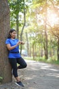 Asian woman checking time from smart watch check heart rate