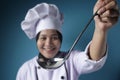Asian Woman Chef Making Soup, Chef Holding Kitchen Tool Ladle Royalty Free Stock Photo