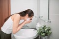 Asian woman cleaning face skin enjoy herself with bubble cleansing foam Royalty Free Stock Photo