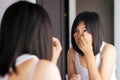 Asian woman cleaning her eye with tissue, Female itching to her eyes Royalty Free Stock Photo