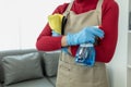 Asian woman cleaning staff, company office cleaning maid, maintaining cleanliness in the office. Cleaning concept and housekeeper Royalty Free Stock Photo
