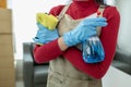 Asian woman cleaning staff, company office cleaning maid, maintaining cleanliness in the office. Cleaning concept and housekeeper Royalty Free Stock Photo