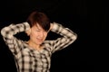 Asian woman covering ears Royalty Free Stock Photo