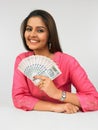 Asian woman with currency notes Royalty Free Stock Photo