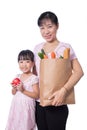 Asian Woman and daughter carrying groceries