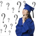 Asian woman deep in thought wearing graduation gown isolated white background Royalty Free Stock Photo