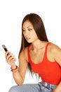 Asian Woman Dialing Camera Phone Royalty Free Stock Photo
