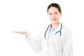 Asian woman doctor with stethoscope hand display something Royalty Free Stock Photo