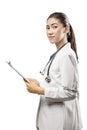 Asian woman doctor in a white lab coat and stethoscope holding clipboard Royalty Free Stock Photo