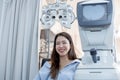 Asian woman doing eyes test in optical lab Royalty Free Stock Photo