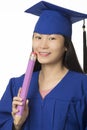 Asian woman wearing blue graduation holding pencil isolated whi Royalty Free Stock Photo